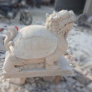 晚霞红风水龙龟石雕是怎么制作出来的?
