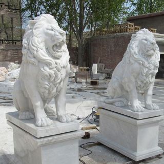 石狮子嘴里为什么含个球，是怎么雕刻的