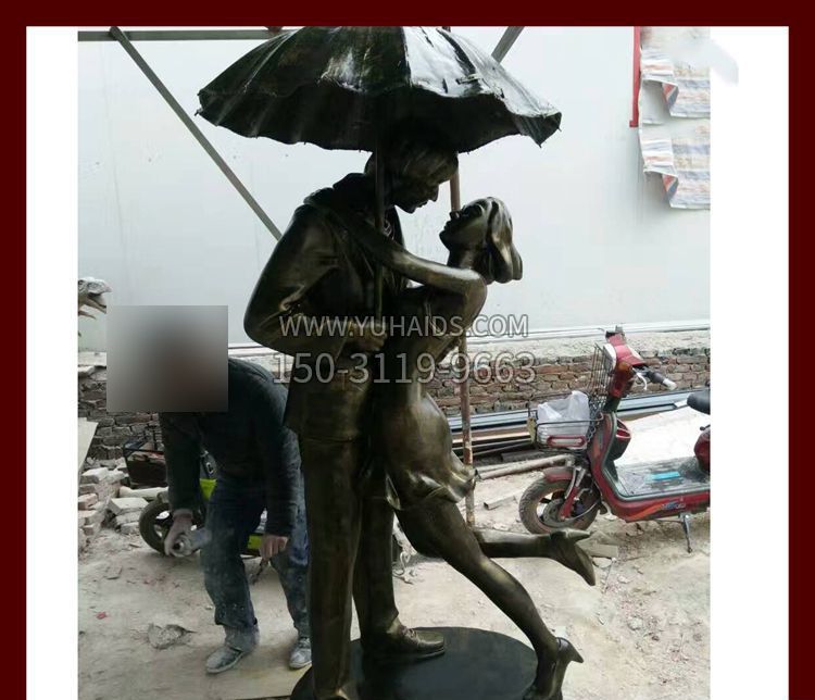 雨伞下拥抱的情侣铜雕博鱼网页版