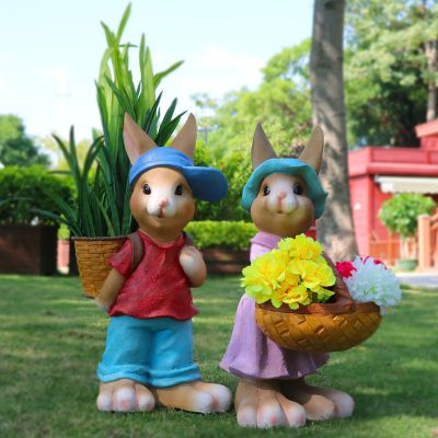 户外草坪两只可爱的玻璃钢兔子博鱼网页版