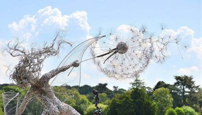 植物园不锈钢抽象人物和蒲公英博鱼网页版