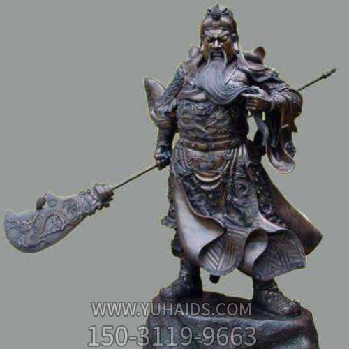 古铜关公像，右手持刀左手捻须站立的关于铜雕像博鱼网页版