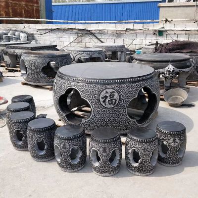 鼓形庭院摆放雕刻镂空石桌圆凳