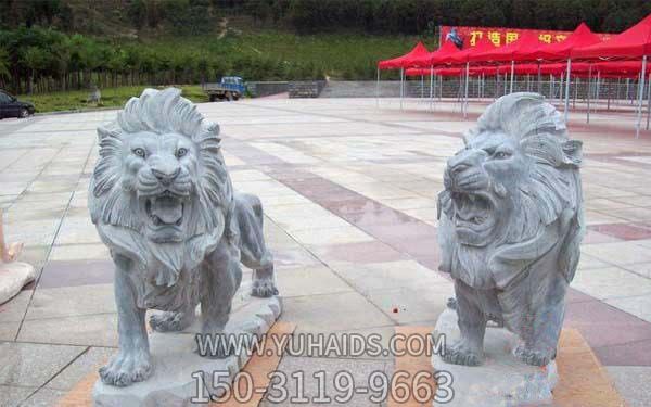 狮子博鱼网页版-户外景区大型行走的砂石石雕狮子博鱼网页版