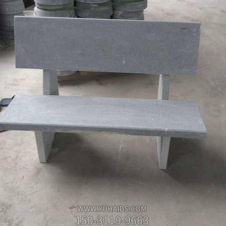 公园边摆放青石雕刻靠背休闲石长凳博鱼网页版