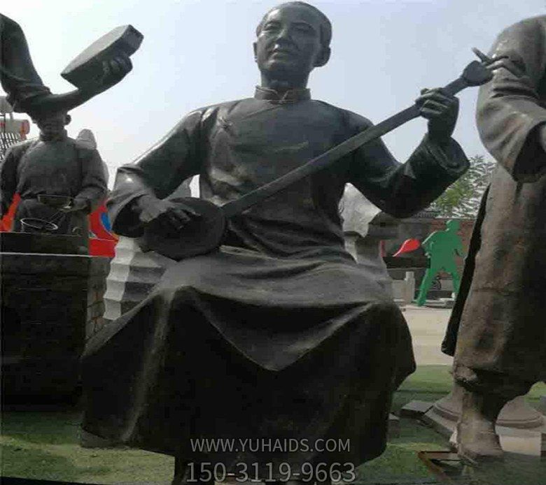 广场铜雕人物景观拉二胡博鱼网页版