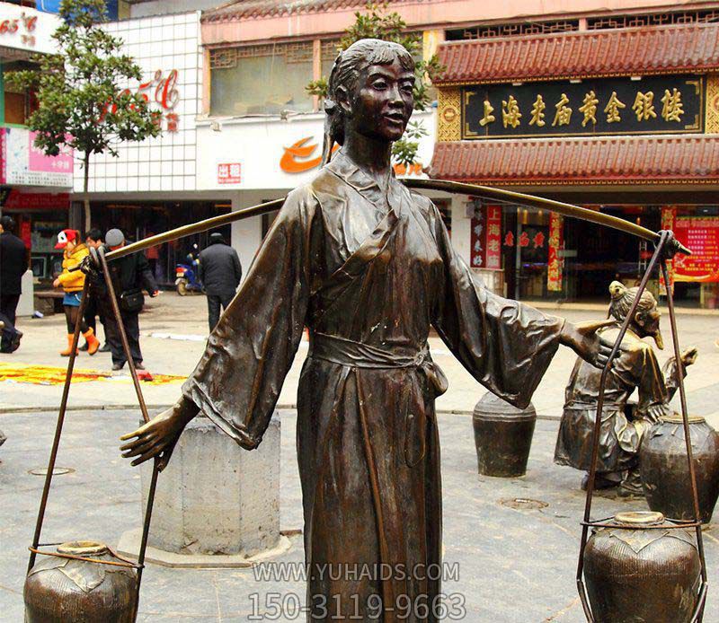 挑着罐子的古代铜雕女孩博鱼网页版