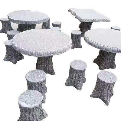 公园景区休闲区摆放大理石圆形树木造型桌椅