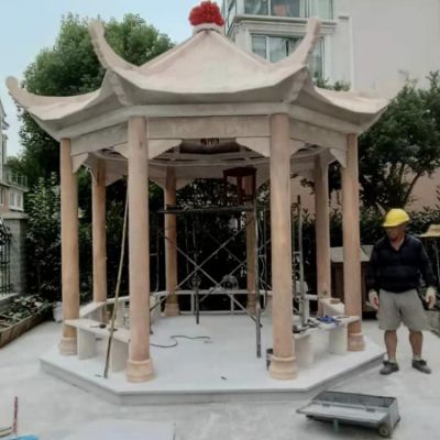 小区花园摆放晚霞红古建筑八角休闲石凉亭