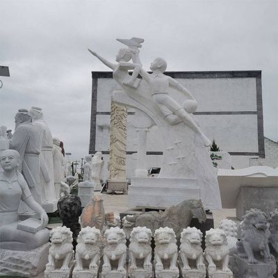 汉白玉雕刻学生人物飞跃主题学校景观博鱼网页版