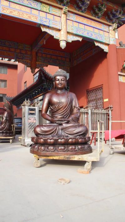 寺庙不锈钢仿铜坐着的如来佛祖博鱼网页版