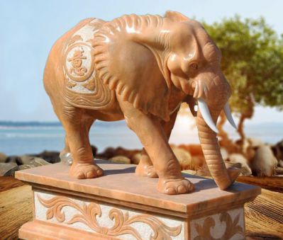 户外景区晚霞红石雕大象博鱼网页版