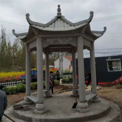 城市街道边摆放青石浮雕中式六角休息凉亭