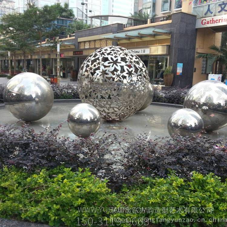 城市广场水池喷泉摆放不锈钢镂空花朵景观球博鱼网页版