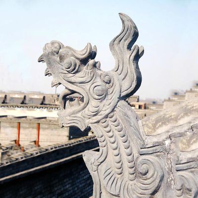 古建筑上摆放的张嘴的青石石雕创意螭吻博鱼网页版