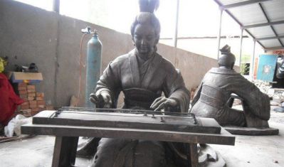 景区一位古代弹古筝的女子石雕古筝博鱼网页版