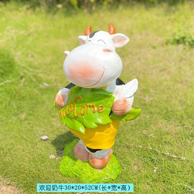 商业街一只拿标识语的玻璃钢彩绘牛博鱼网页版