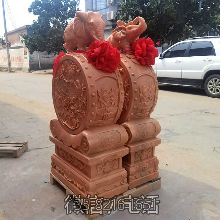 一对晚霞红大象石门墩