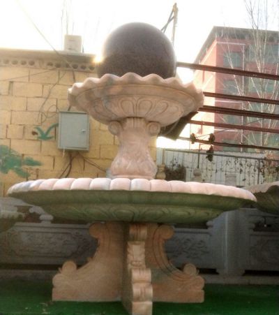 晚霞红石雕风水球喷泉